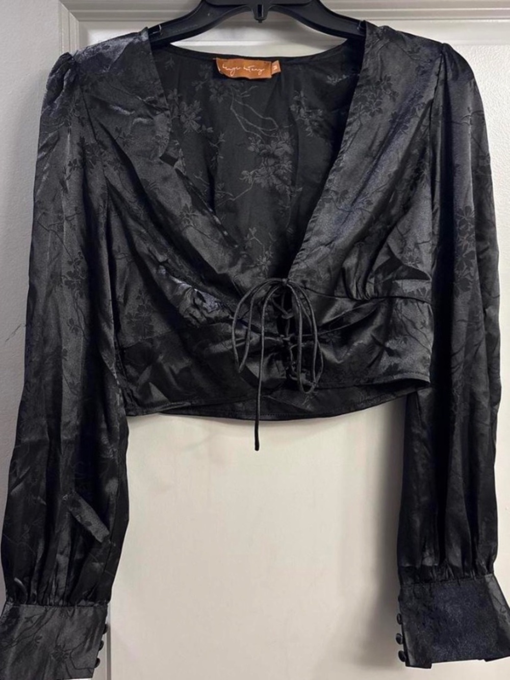 Black lace up blouse with bell sleeves